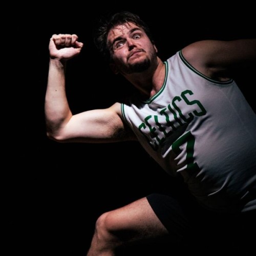 An image of a man in a powerful pose