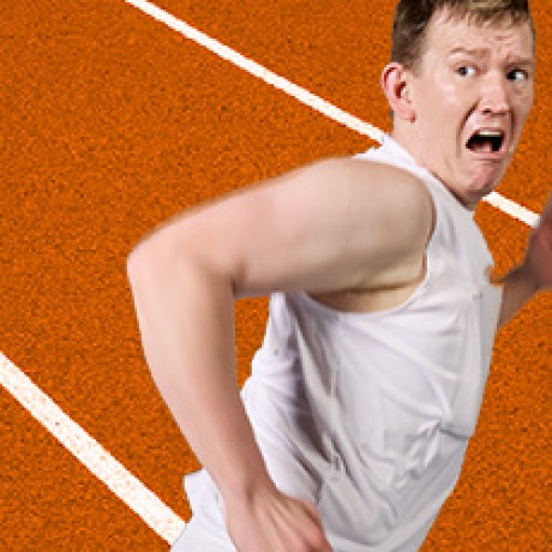 Close up of someone running on a track field