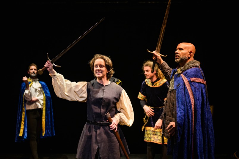 An image of the cast of Saint Joan on stage in costume