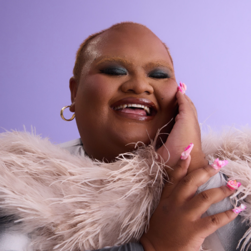 4 side by side matching images of Jonjon with hands framing their face, beautiful  pink nails and a beautiful light pink fluffy throw